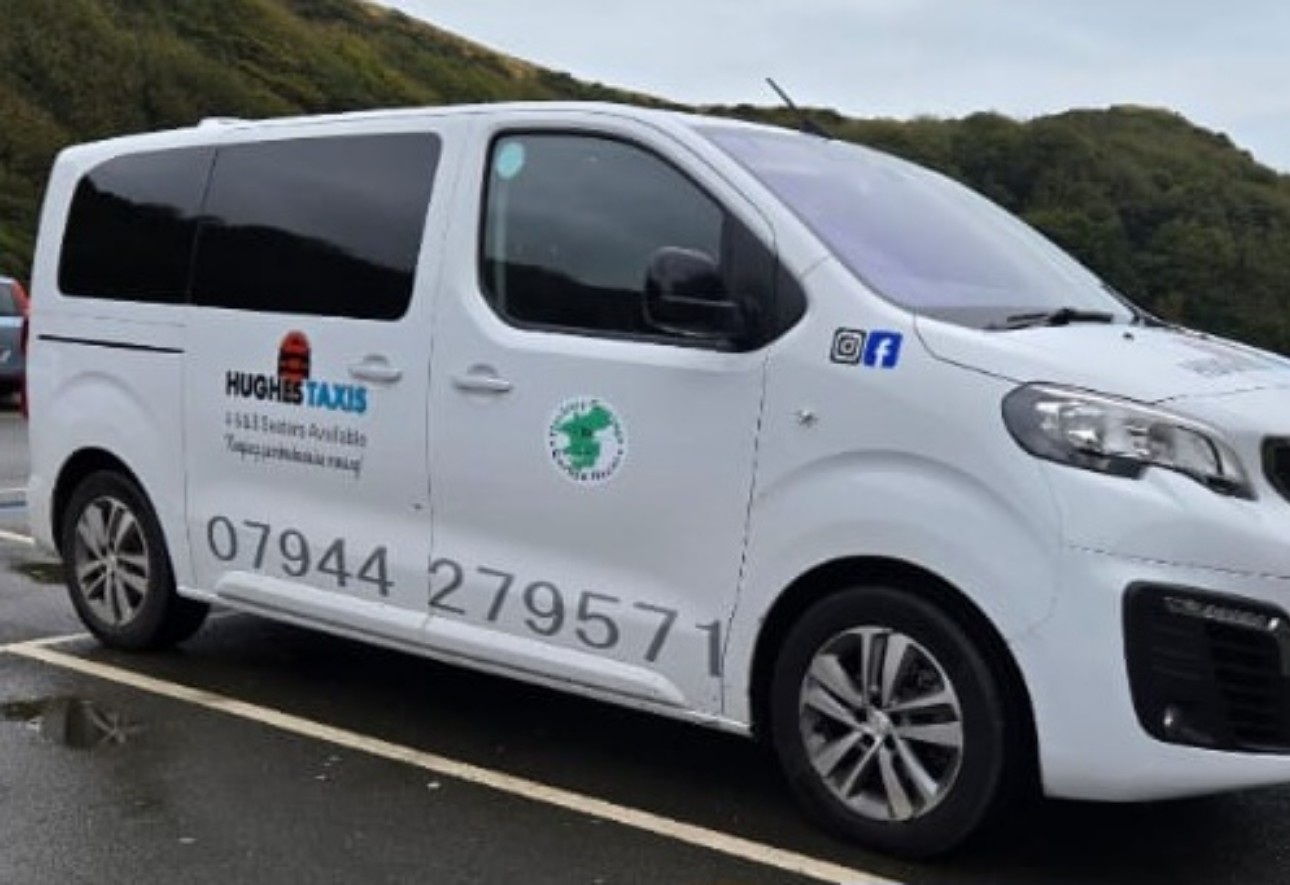 Hughes Taxis passenger vehicle
