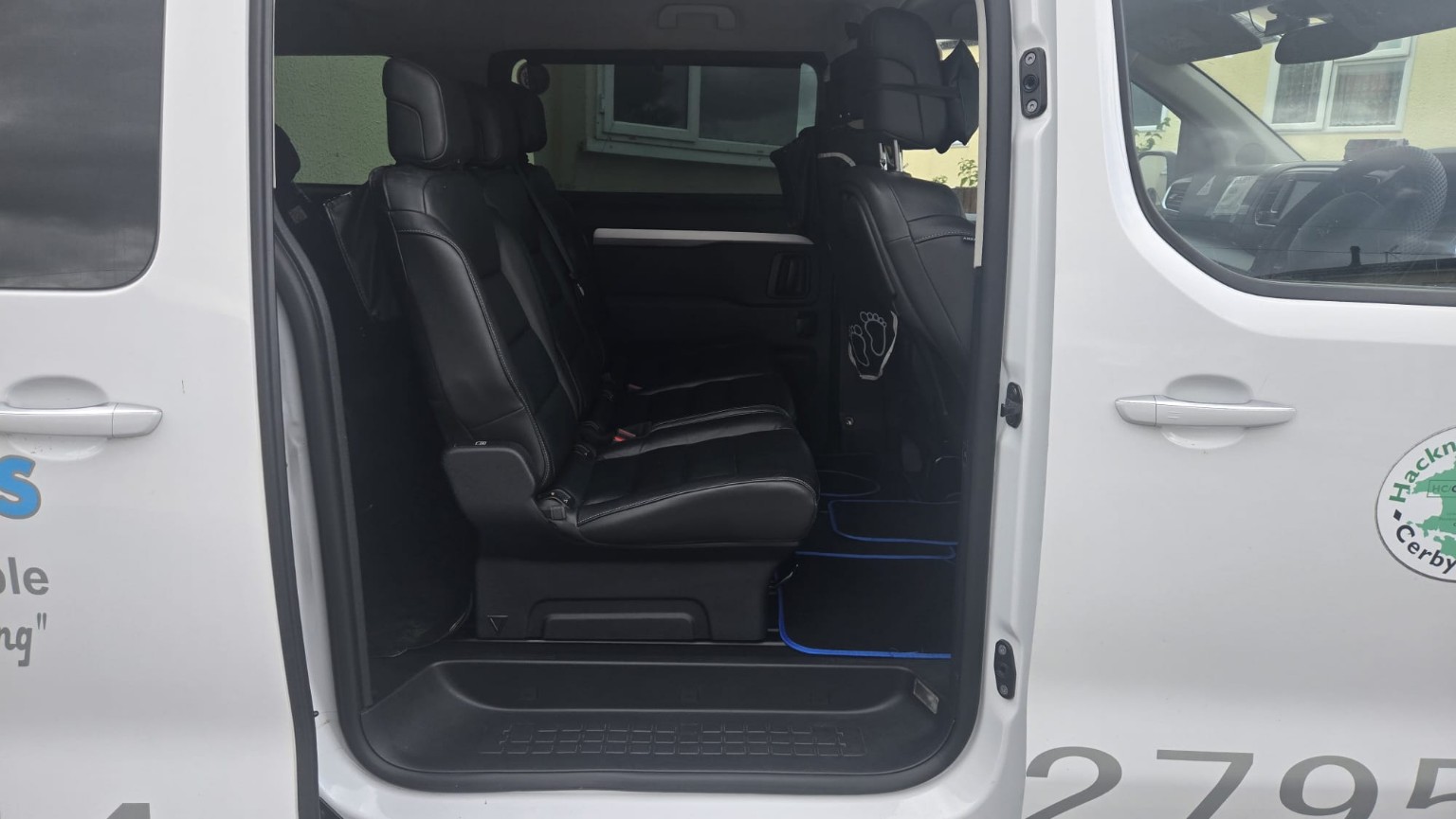 Passenger seating inside a Hughes Taxis vehicle